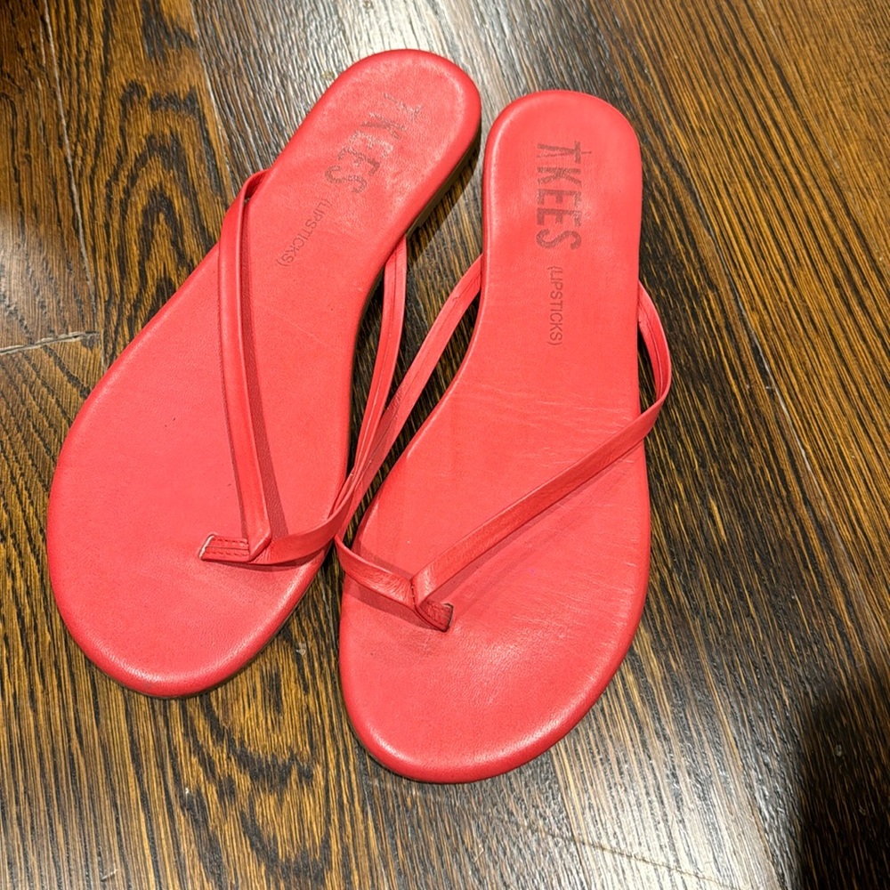 Tkees salmon color, size 8 in great condition, worn 3 times